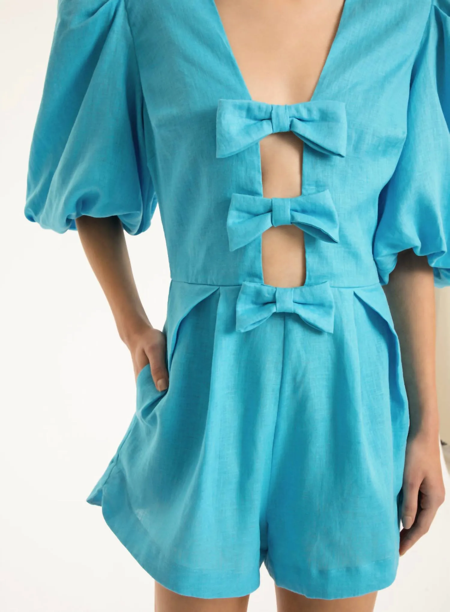 Fantasy Solid Playsuit With Bows In Turquoise